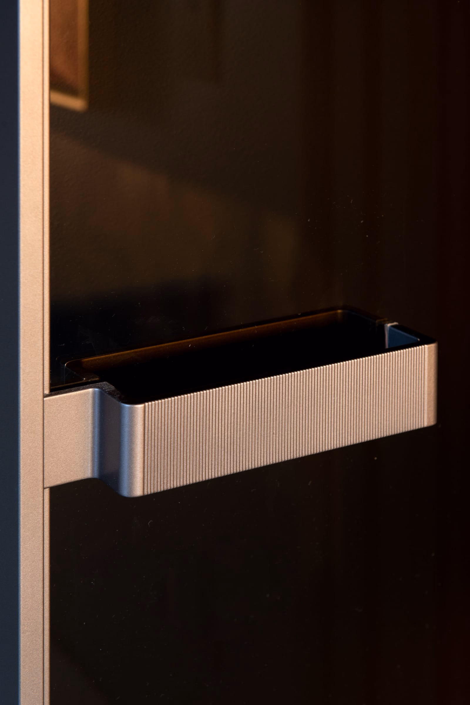 A black door with a silver handle