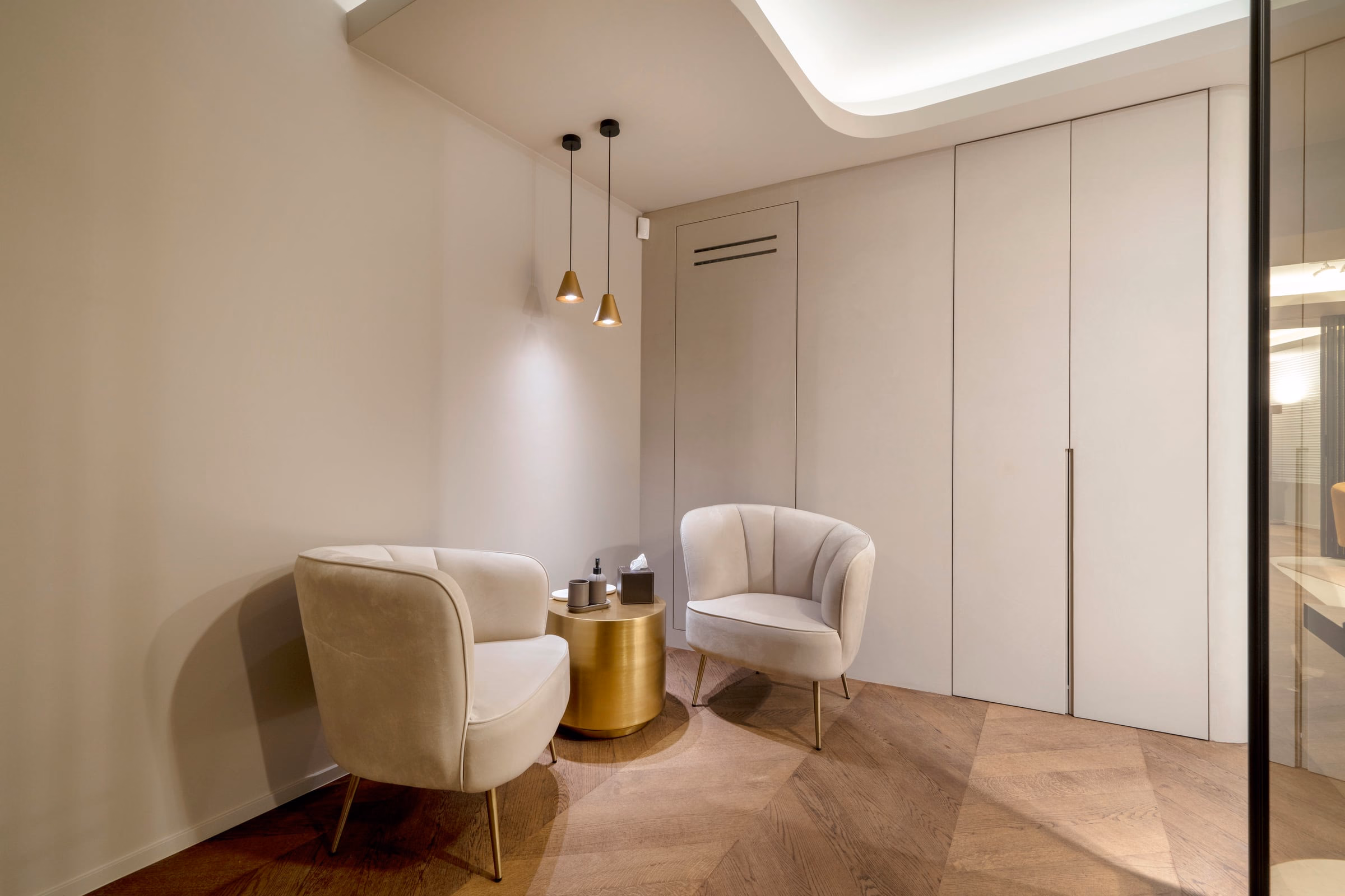 A room with two chairs and a small table
