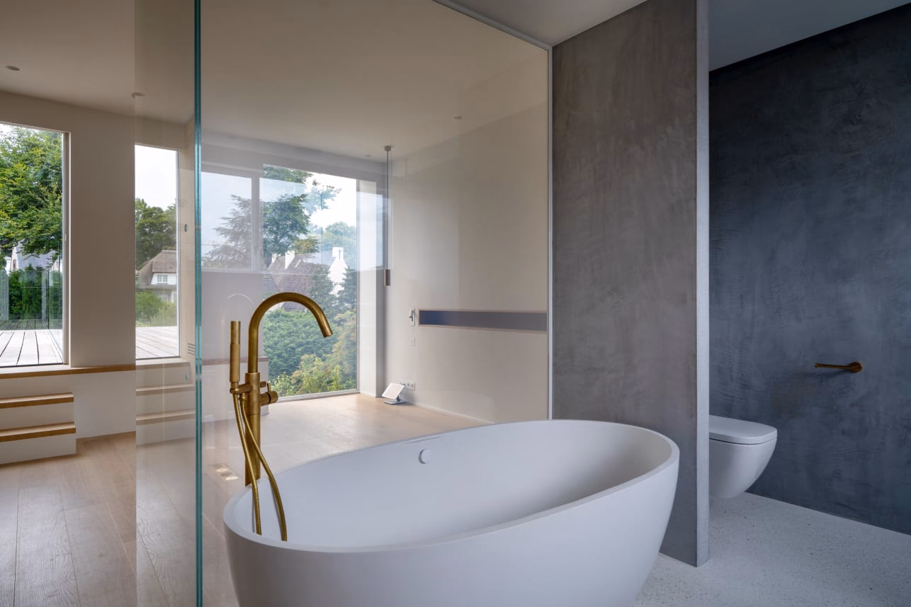 A bathtub with a brass tap