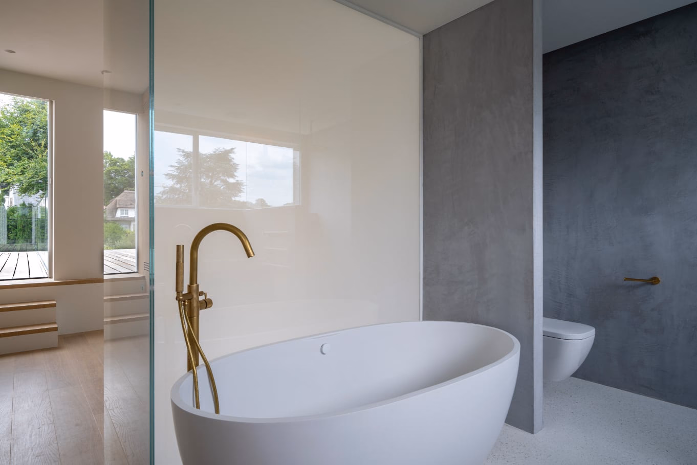 A bathtub with a brass tap