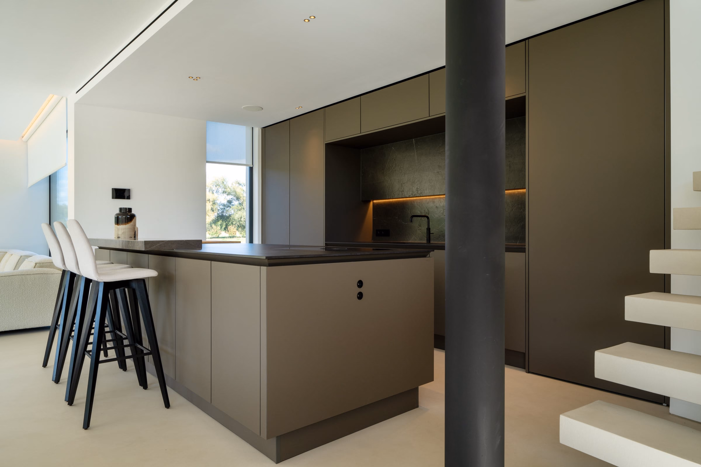 A kitchen with a large central island