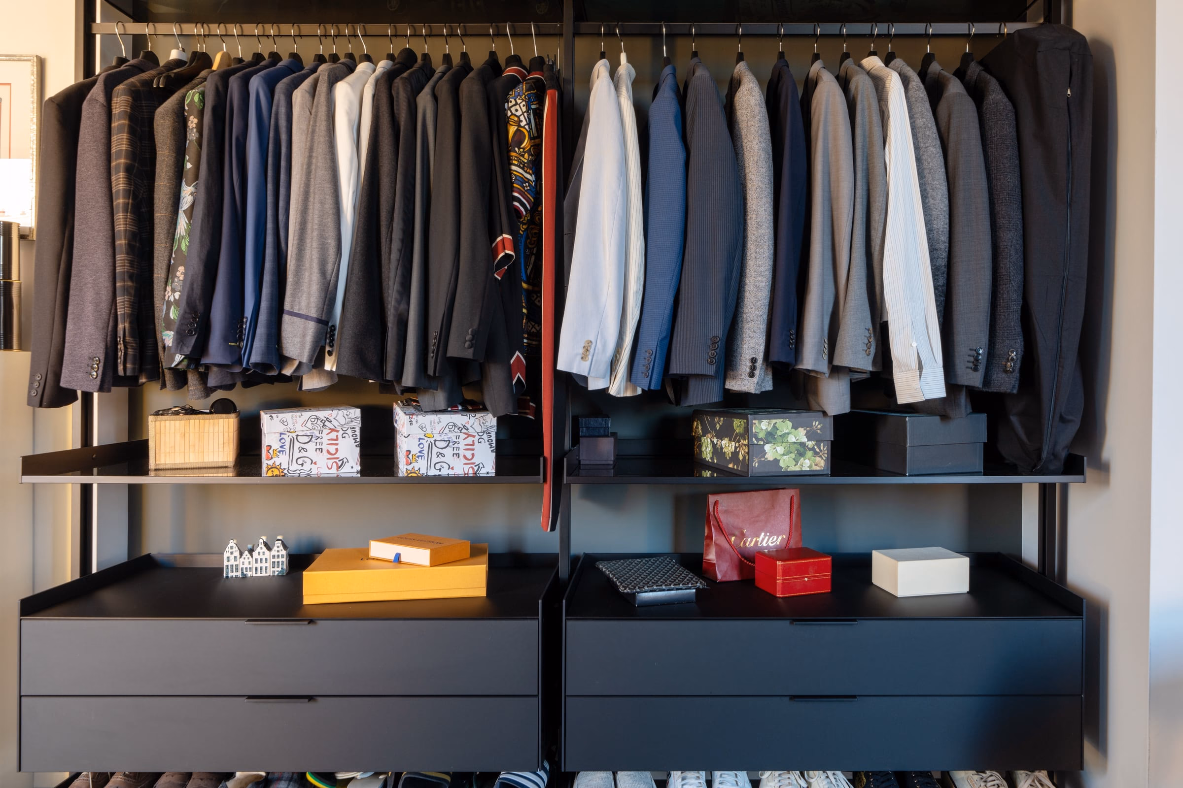 A shopping bag on a shelf in a walk-in wardrobe