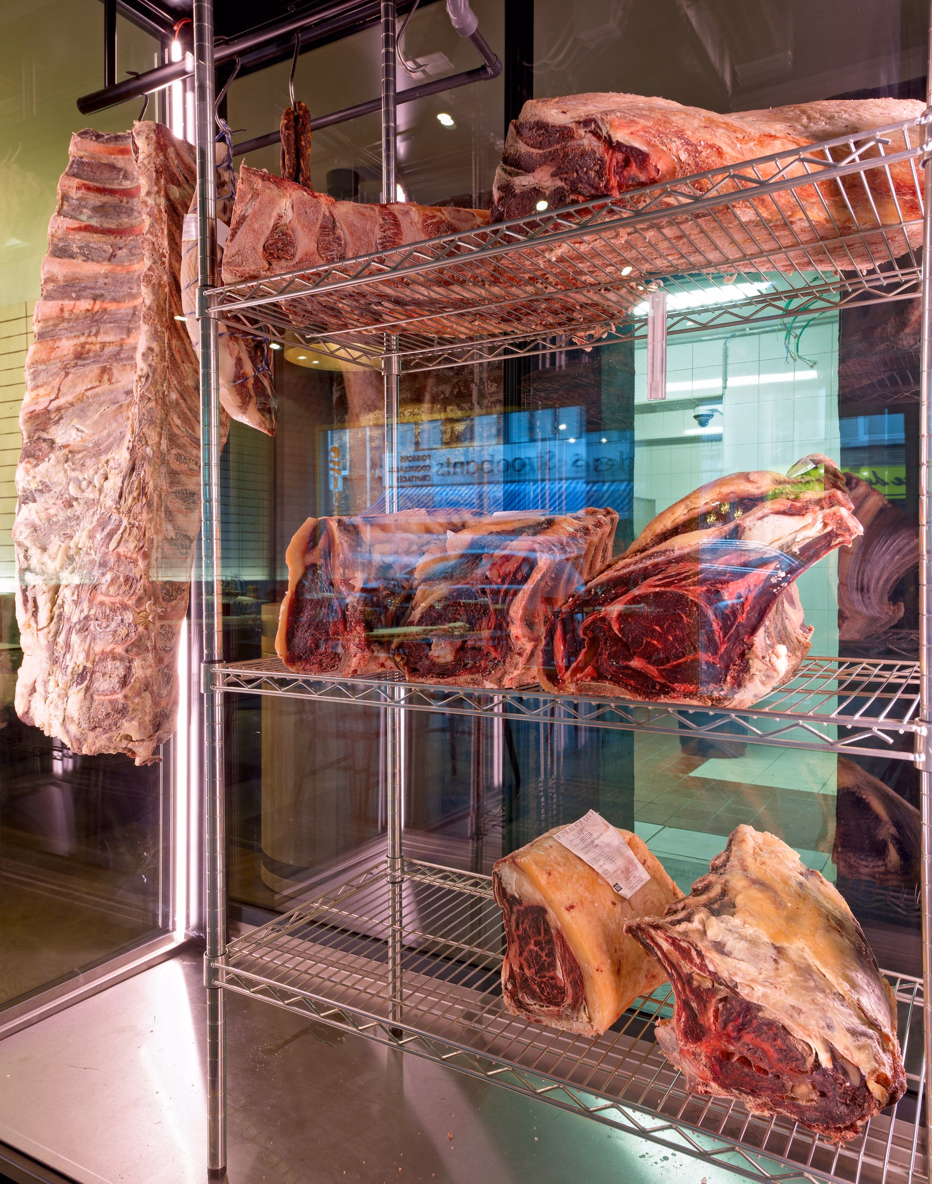 Cuts of meat ageing in a display cabinet