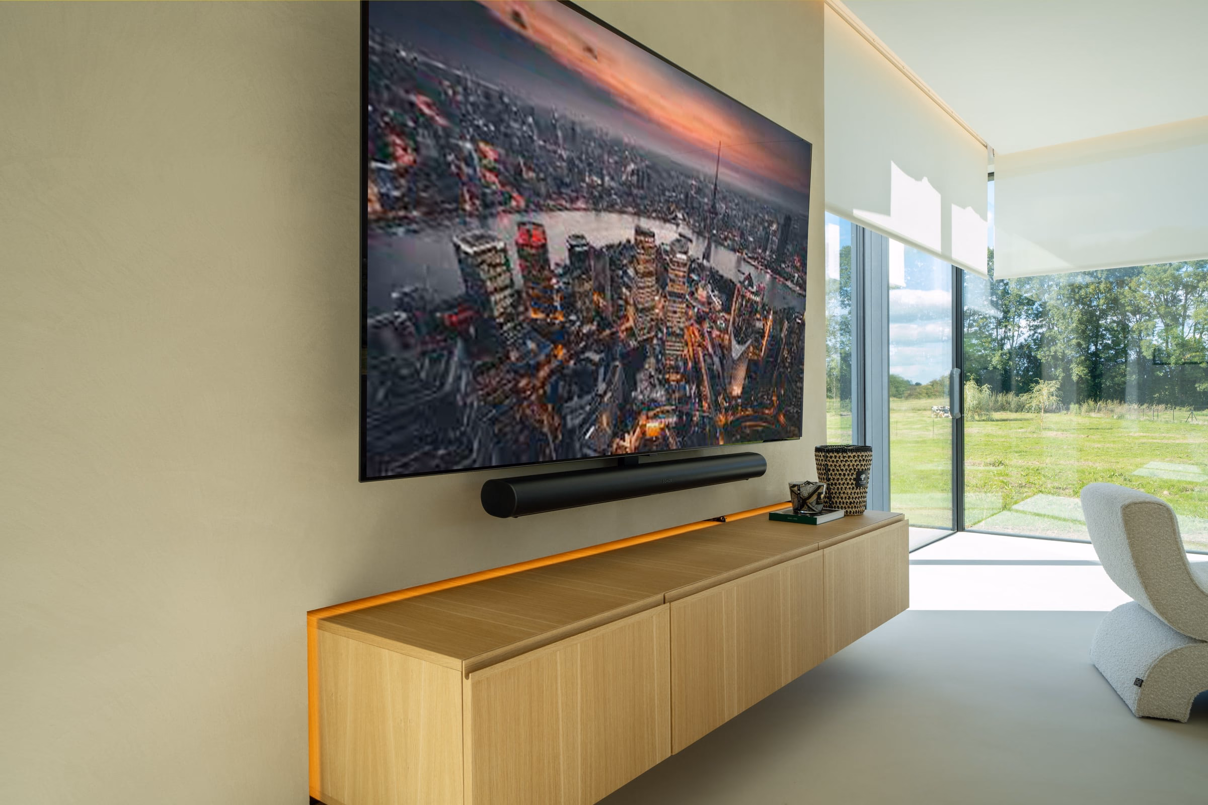 A television above a wooden media unit