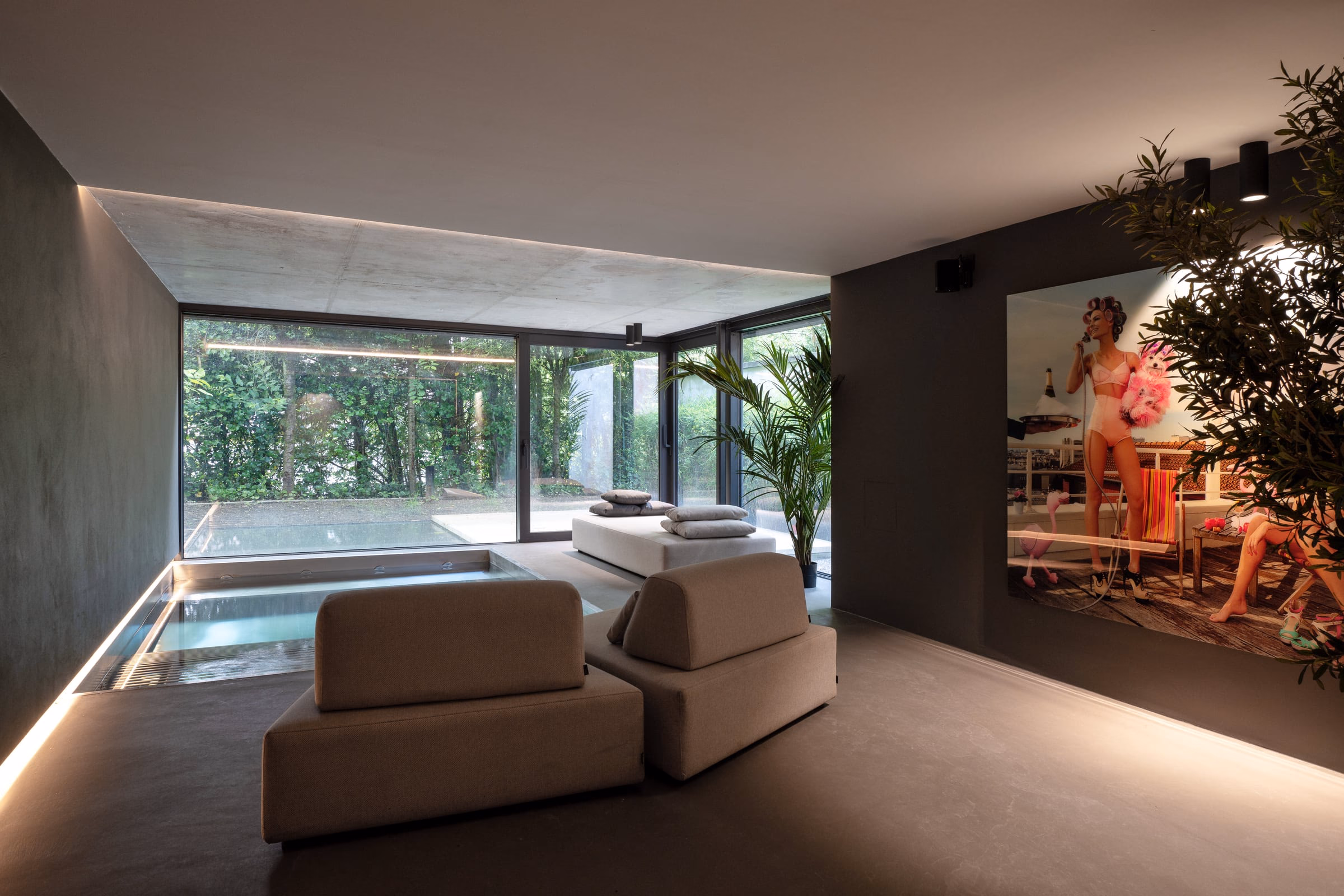 A living room with a photograph on the wall