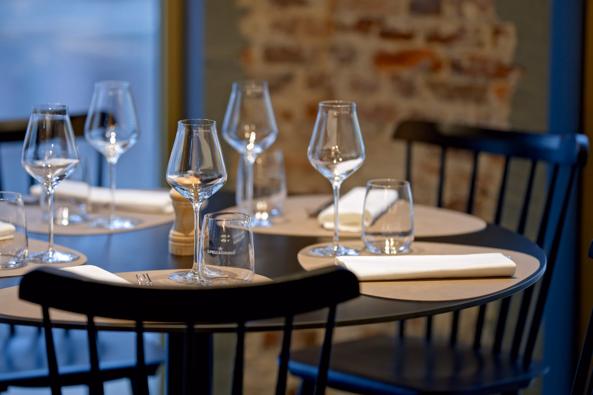 Empty wine glasses on a laid table