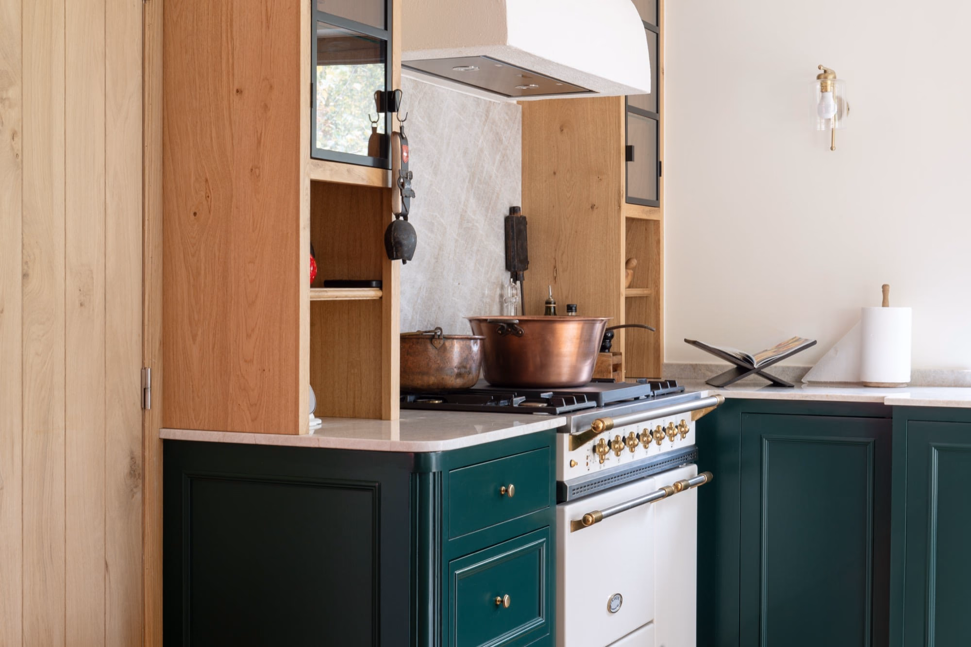 A copper pan on the hob in a kitchen