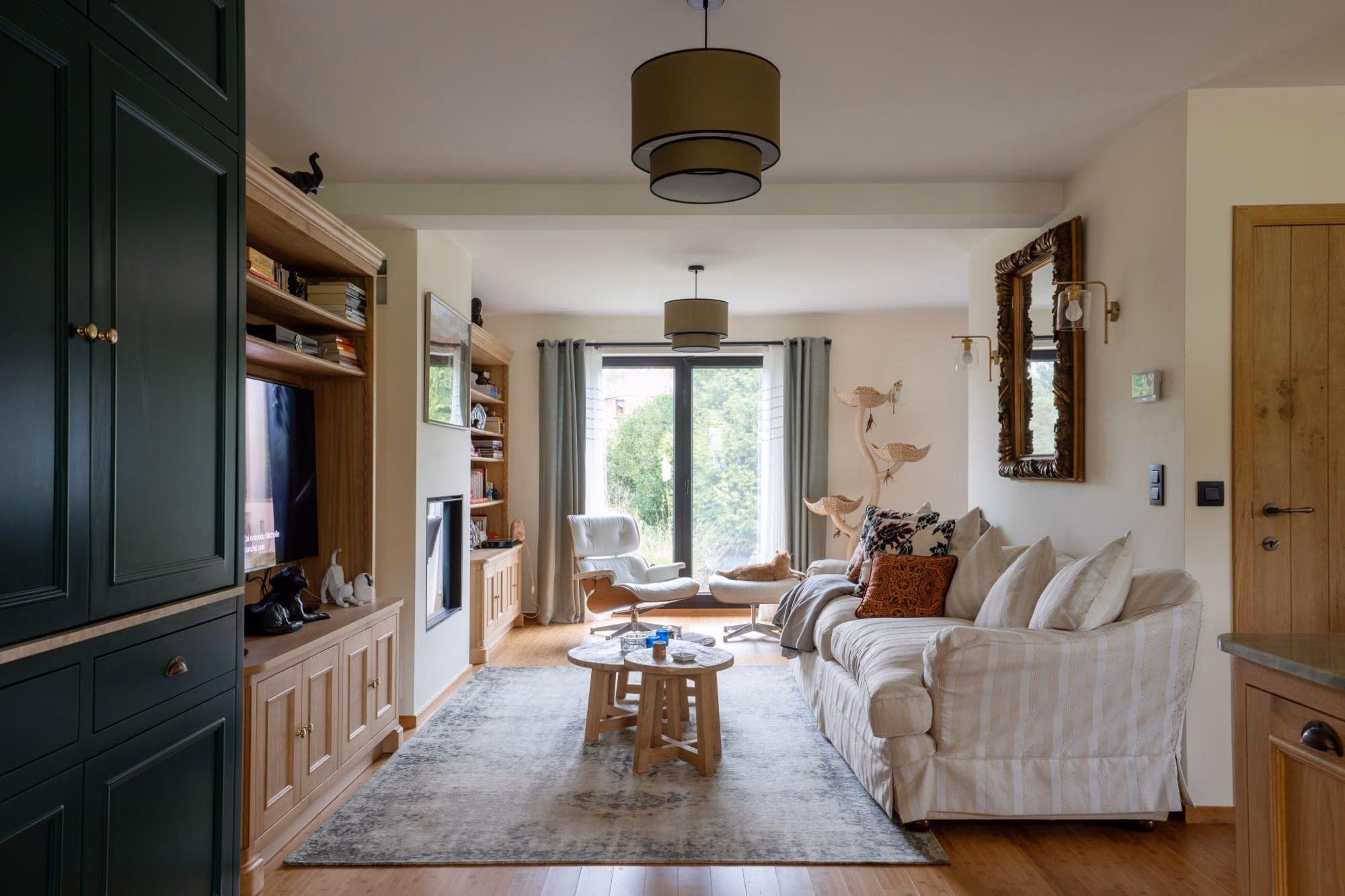 A living room with a sofa and an armchair