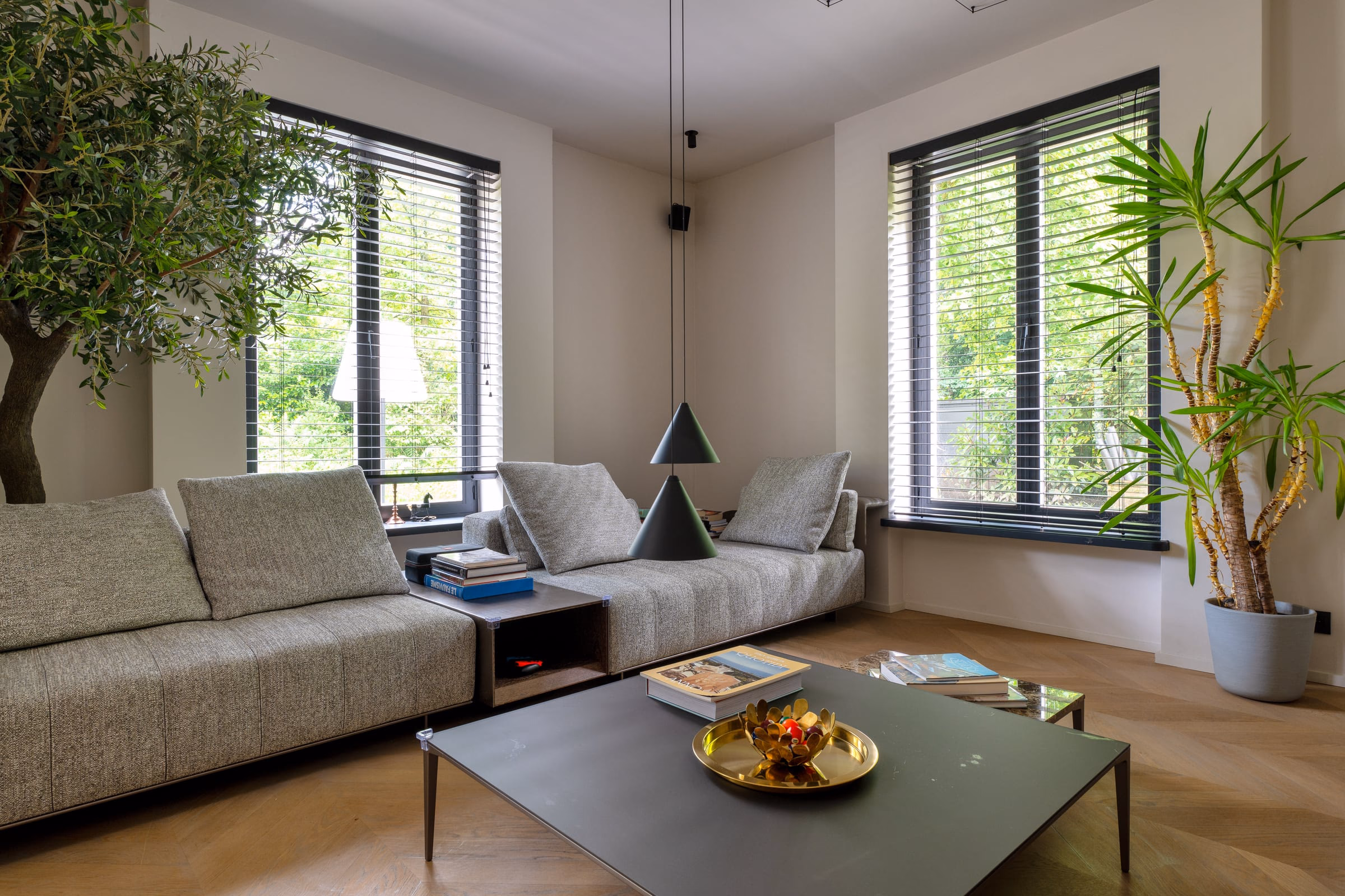 A living room with a sofa and a coffee table