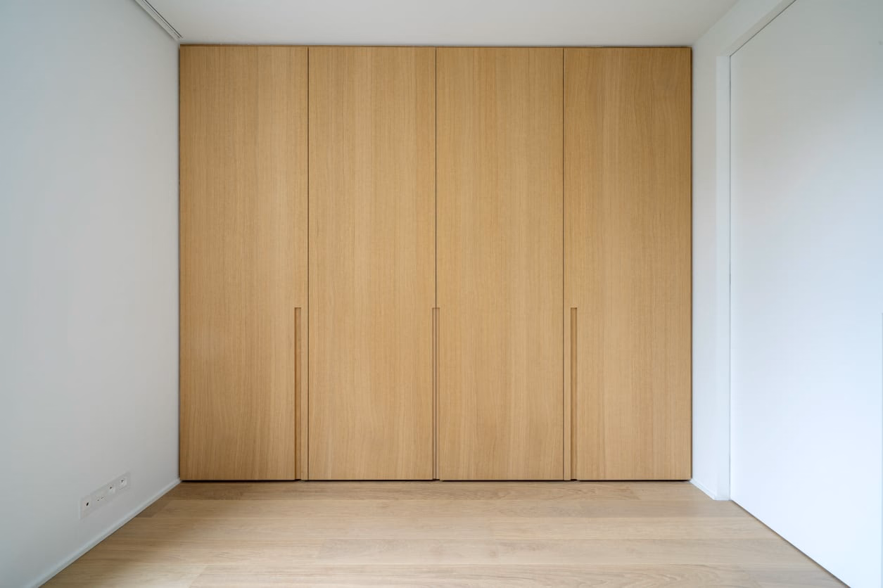 A room with wooden walls and a wooden floor