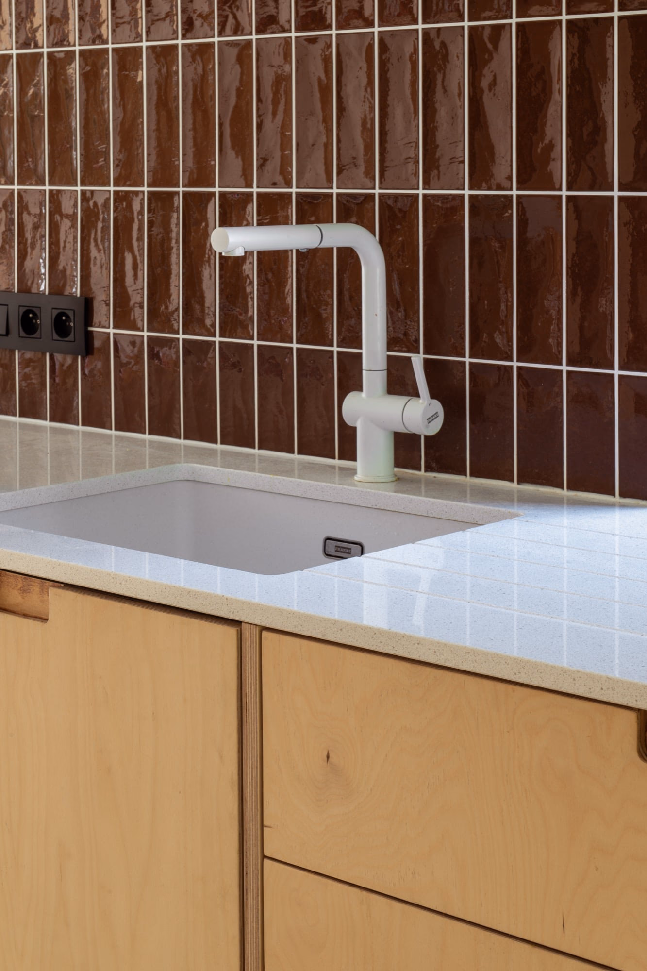 A kitchen sink and tap