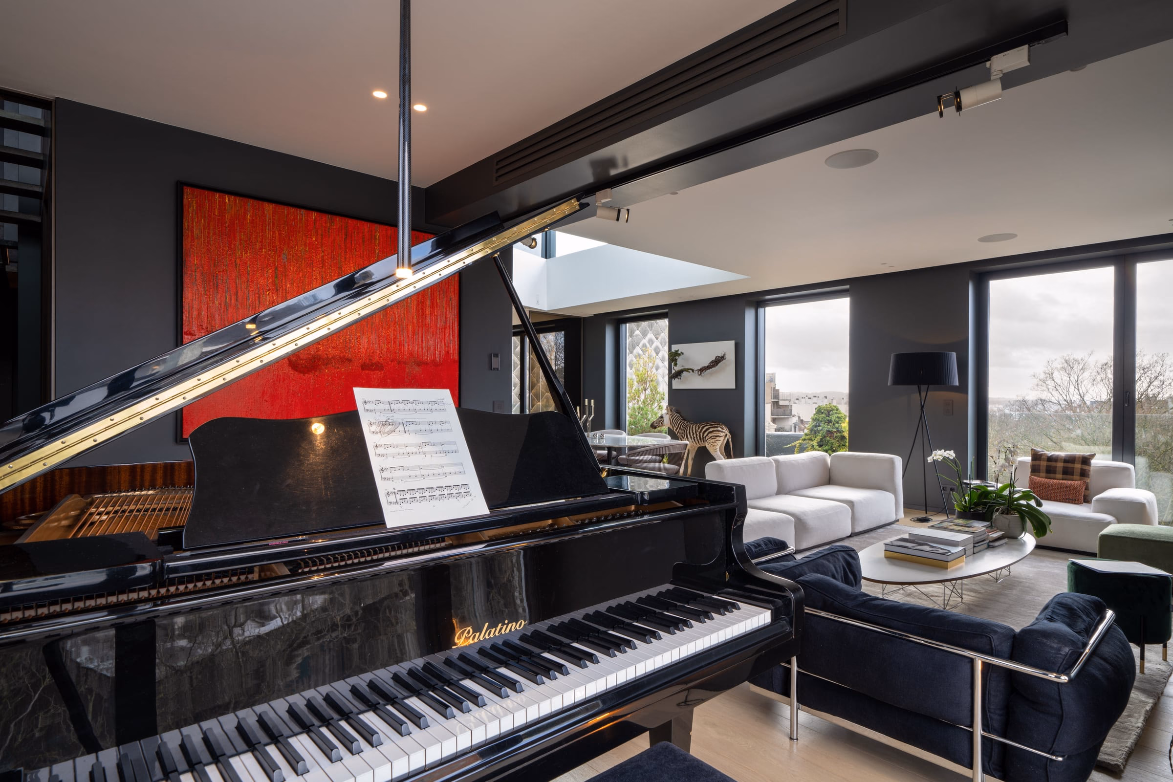 A grand piano in a living room