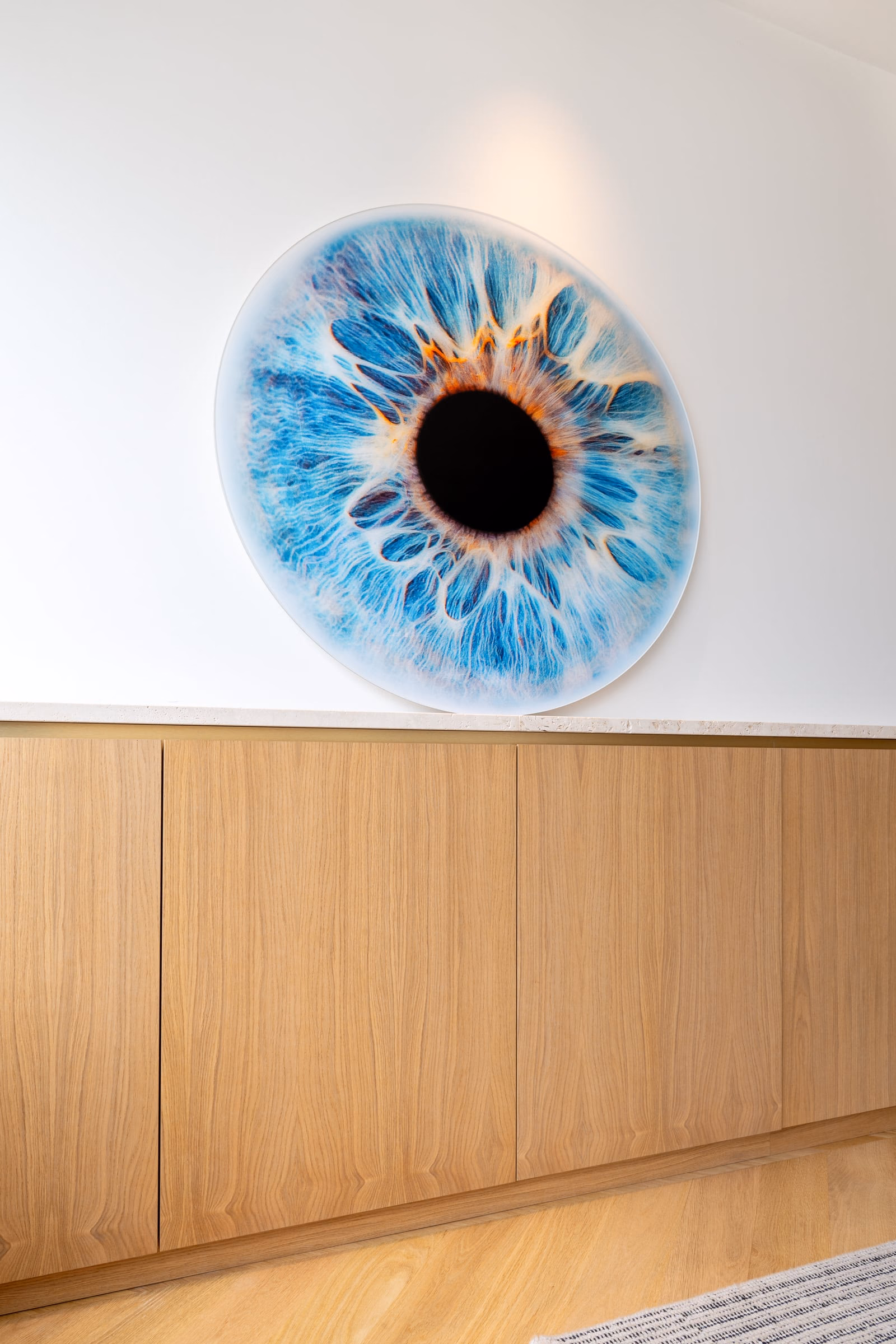 A painting of a blue eye