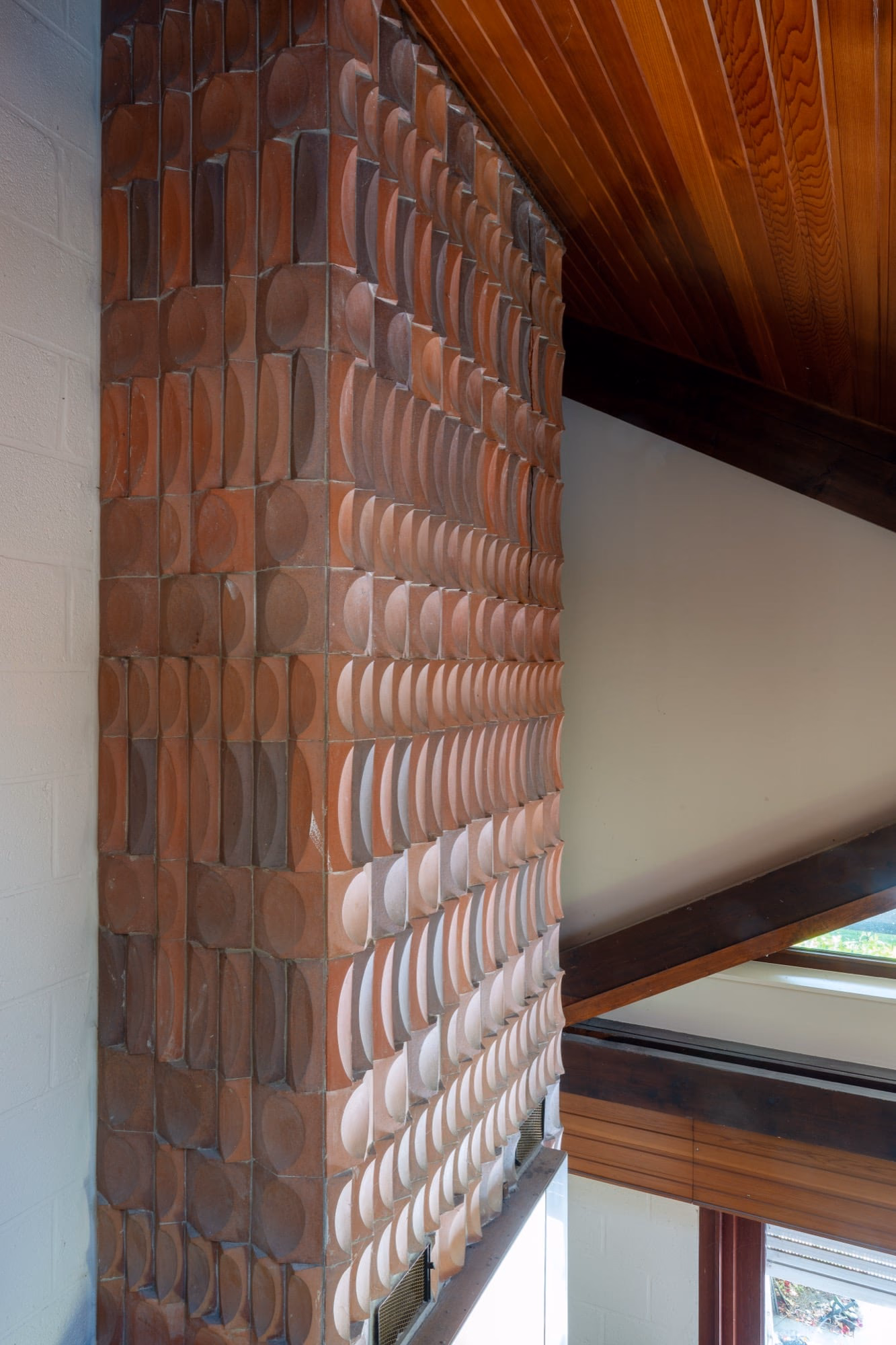 A brick wall with a geometric pattern